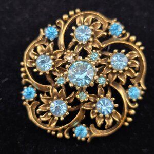 Vintage Coro Gold-Tone Baroque Brooch With Blue Rhinestones Floral Design